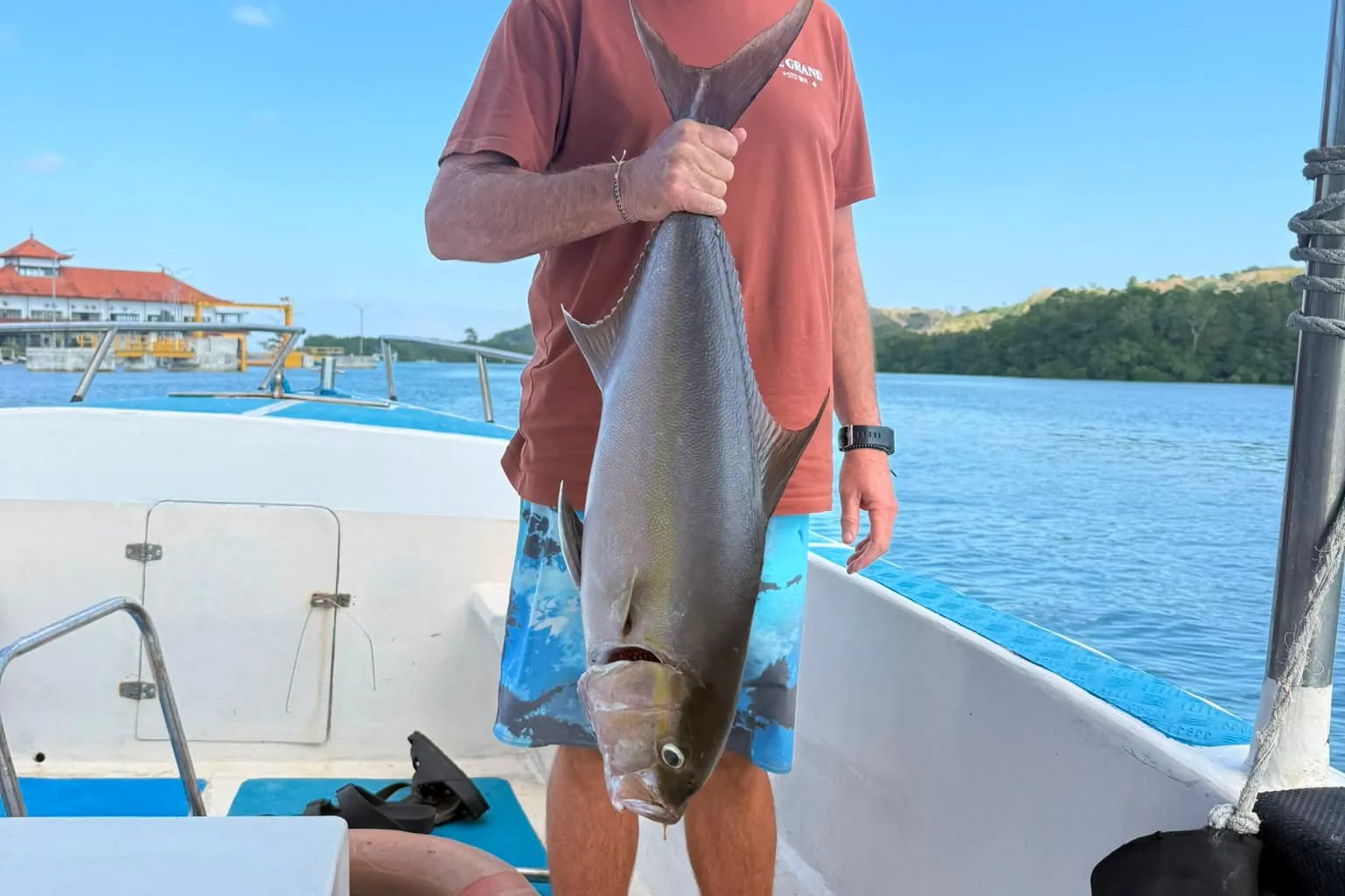 A guest on board with a Spanish mackerel caught offshore