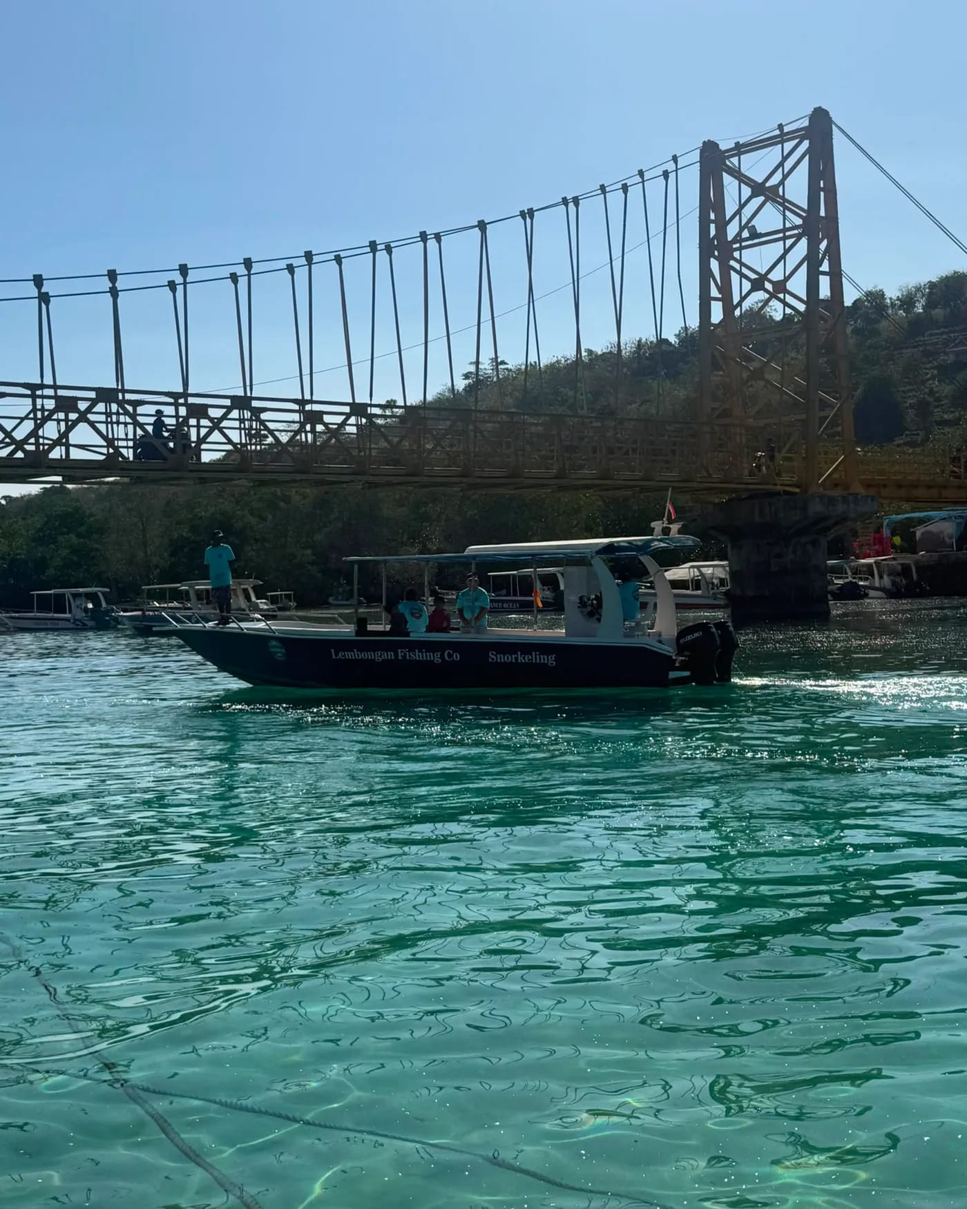 The charter boat moored beside the island
